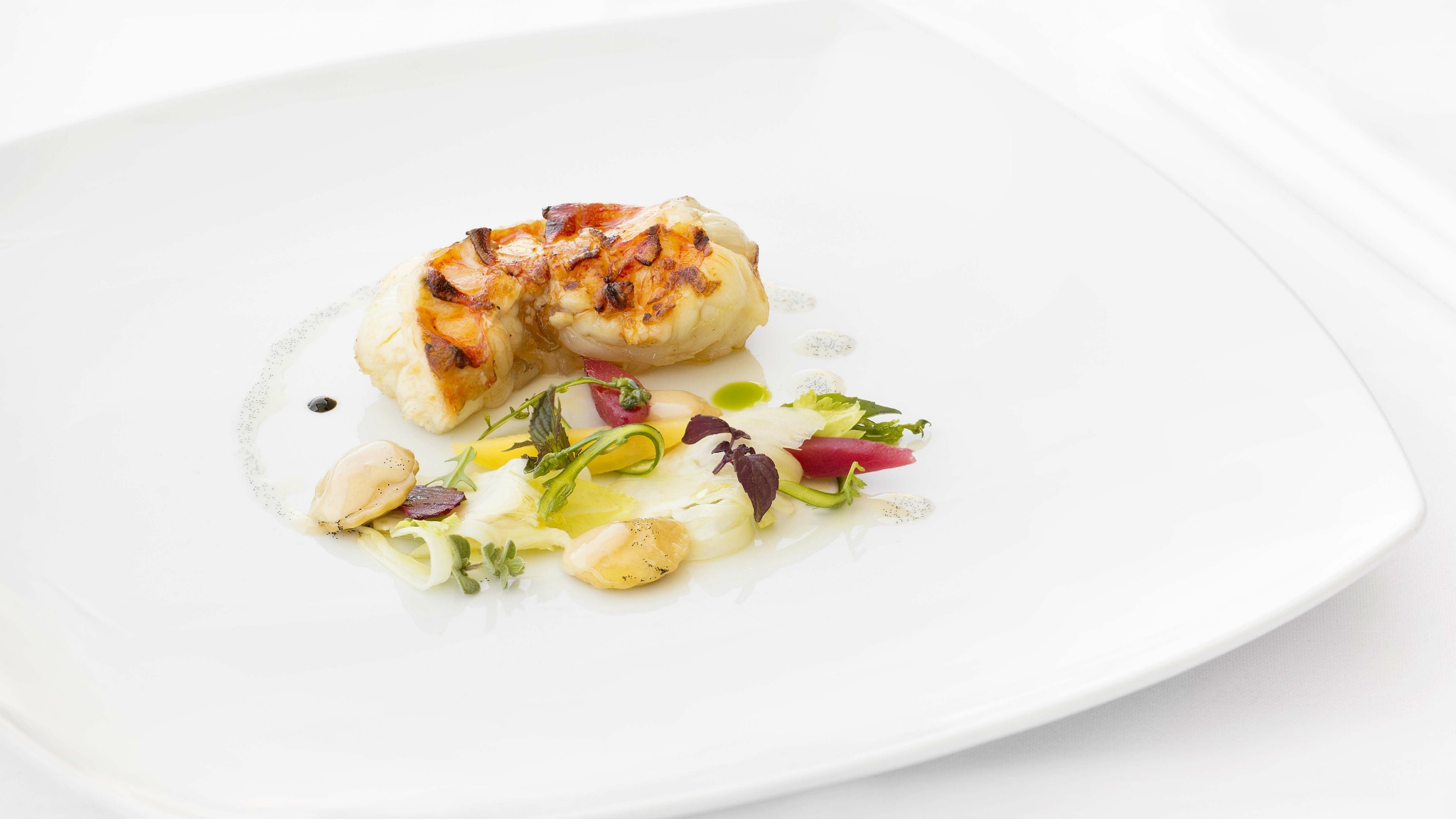 GB Roof Garden Restaurant Grilled lobster tail homemade ravioli with fennel lemongrass and vanilla